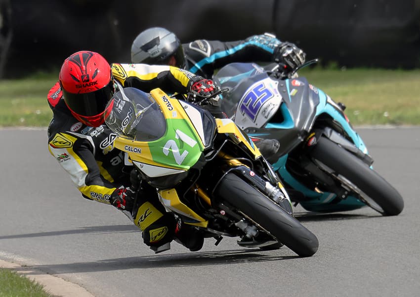 Two PDMCC riders mid-corner at Three Sisters Race Circuit, Wigan